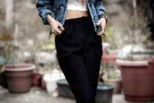 With white crop top, black crop pants and ankle boots