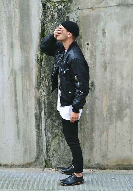With white oversized t-shirt, skinny pants, oxford shoes and leather jacket