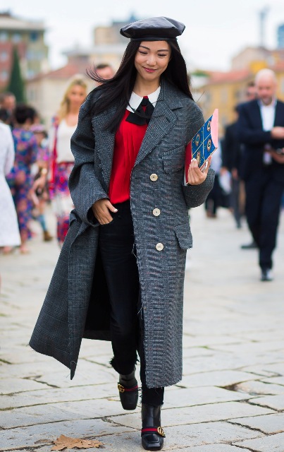 With white shirt, red sweater, black pants, boots and gray maxi coat