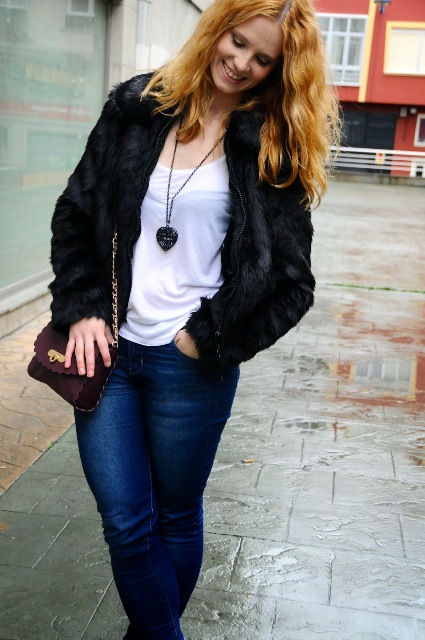 With white top, jeans and marsala bag