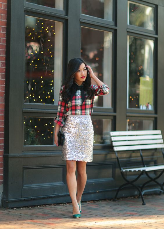 a plaid shirt, a silver sequin skirt, a bow and emerald shoes