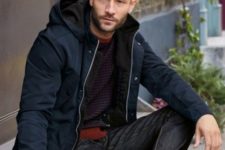 05 black jeans, a burgundy sweater, a black puffer jacket and white sneakers