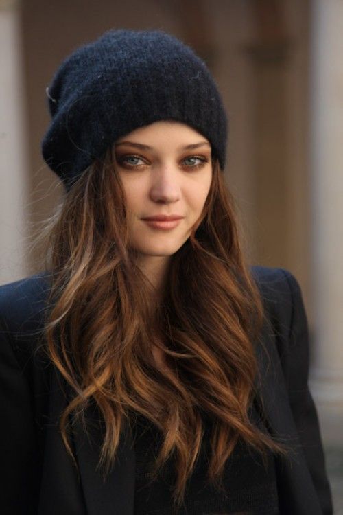 loosy waves and a black beanie that doesn't distract attention from the beautiful hair