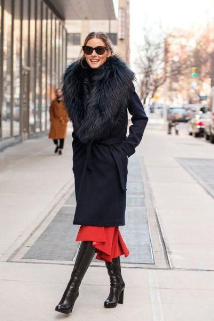 a black knee coat with a large faux fur stole for very cold winter days