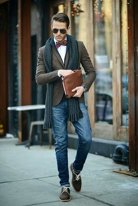 blue denim, a tweed jacket, an emerald scarf, brown shoes and plaid bow tie