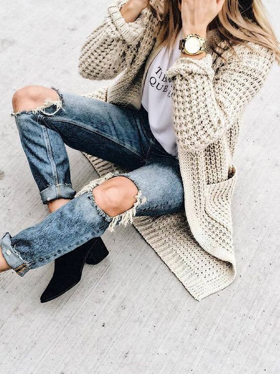 ripped denim, black suede booties and a neutral chunky knit cardigan
