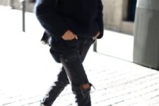 09 ripped black jeans, black boots and an oversized black angora sweater