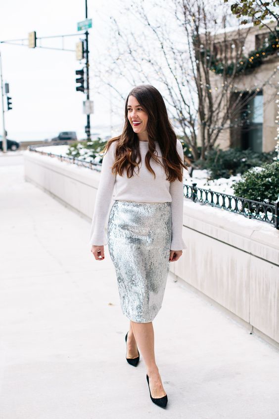 a white sweater, a silver sequin pencil skirt and black suede shoes