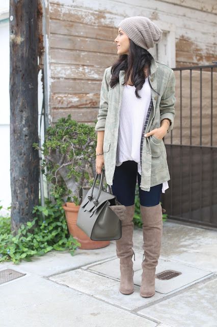 a neutral slouchy beanie matches the tall boots and keeps warm