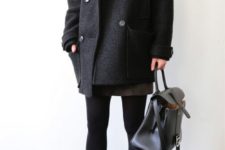 12 a short black coat with a straight silhouette, a backpack, black tights and black boots
