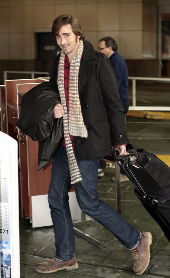 navy jeans, a red sweater, a scarf, a black coat and brown boots by Lee Pace