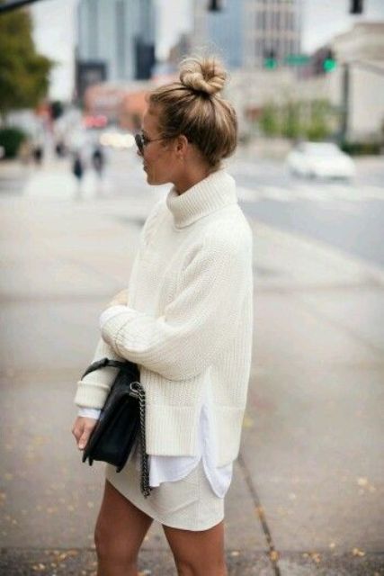a white shirt, a white mini, an oversized chunky knit turtleneck sweater for a chic look