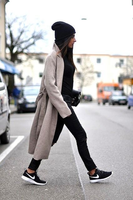a light grey coat and a black lseek beanie is a perfect combo