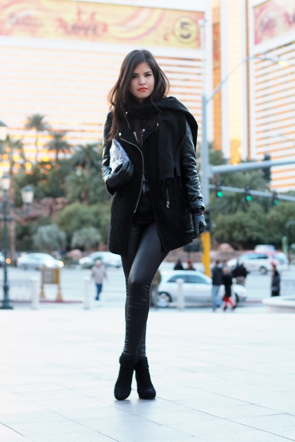 Black leather pants with ankle boots, mini coat and clutch