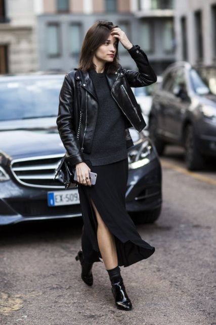 Black shirt, maxi skirt, leather jacket, mini bag and leather boots