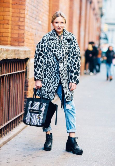 With animal printed coat, platform boots and tote