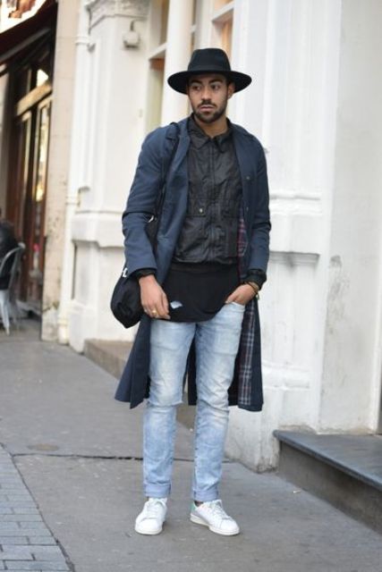 With black shirt, light blue jeans, white sneakers and navy blue trench coat