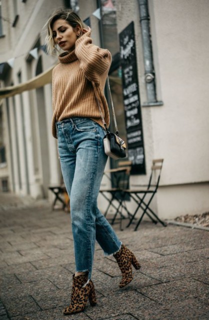 With brown sweater, embellished bag and leopard printed boots