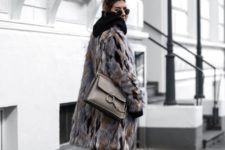 With fur coat, flat boots and gray bag