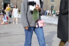 With gray sweater, fur collar, pink mini bag and printed shoes