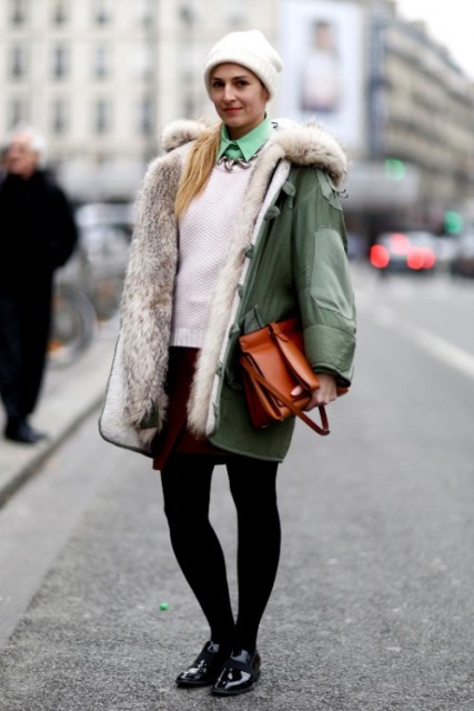 With green shirt, white sweater, marsala mini skirt, black tights, flat shoes, beanie and brown bag
