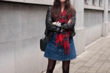 With leather jacket, denim skirt, mid calf boots and black bag