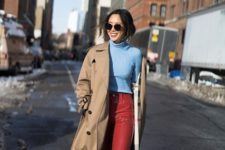 With light blue turtleneck, mid calf boots and camel coat