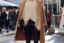 With oversized sweater, black ankle boots and camel coat