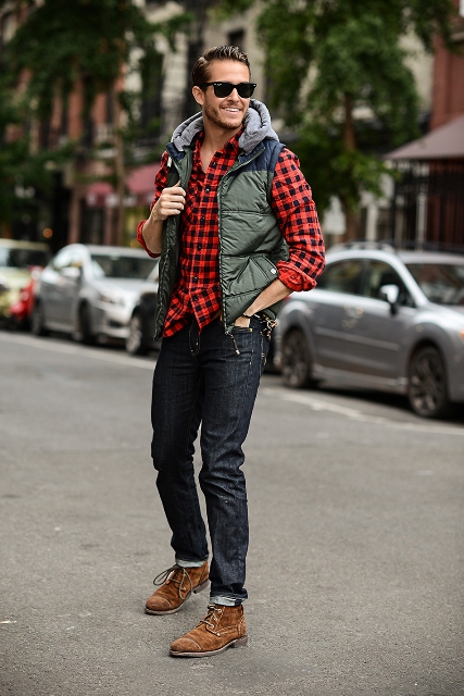 With plaid button down shirt, puffer vest and suede boots