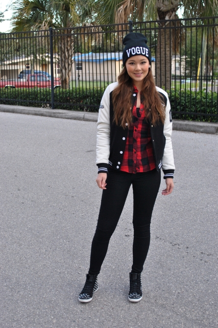 With plaid shirt, leggings, beanie and printed shoes