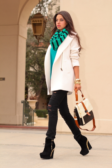 With printed scarf, white coat, distressed pants and leather bag