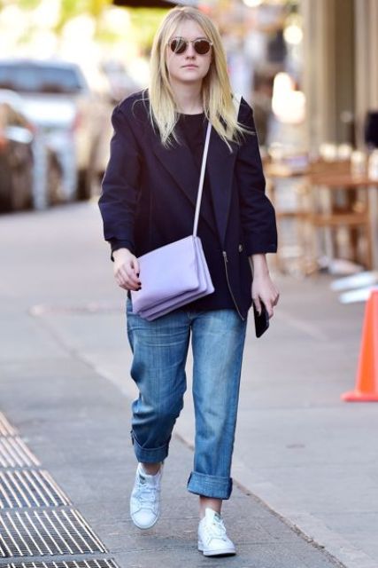 With purple jacket, white sneakers and crossbody bag
