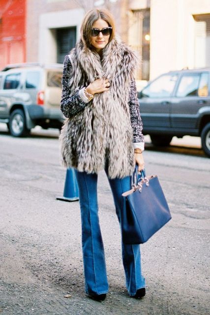With shirt, fur vest and navy blue tote