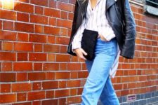 With striped shirt, black leather jacket, black clutch and crop jeans