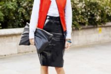 With white button down shirt, leather pencil skirt, beige shoes and clutch