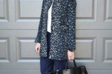 With white shirt, pumps, black leather bag and leopard printed coat
