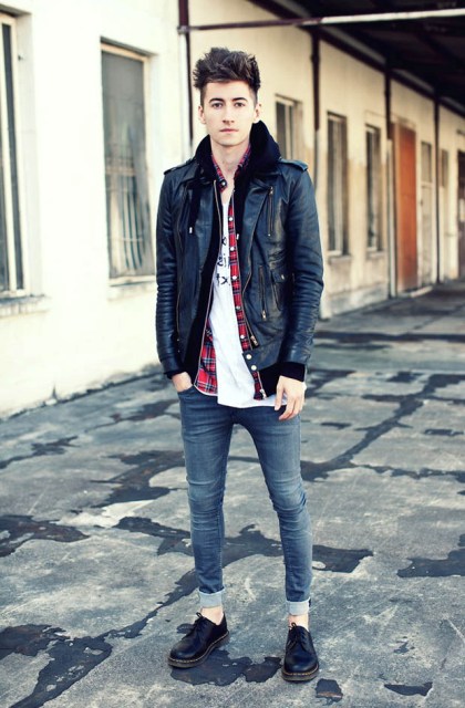 With white t-shirt, black leather jacket and black shoes