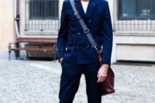 With white t-shirt, navy blue jacket, marsala bag and marsala shoes