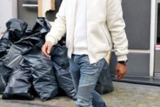 With white t-shirt, white jacket, jeans and white sneakers