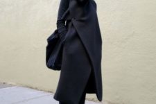 Wrap coat with black pants, boots and tote