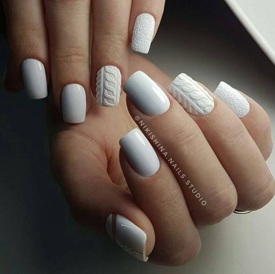 white cable knit and textural nails look very comfy in winter