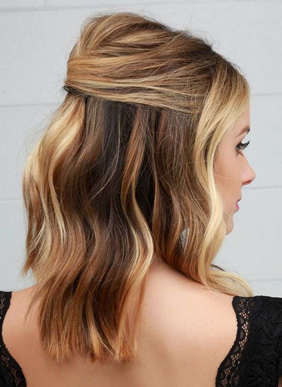 a wavy half up lob is a chic idea not only for a party but also for a date
