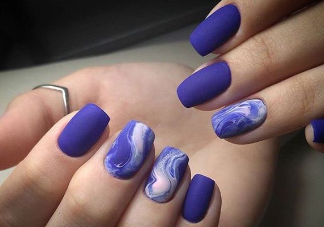matte ultra-violet nails with beautiful marble accents show two trends in one