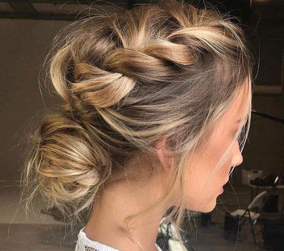 a messy braided updo with a low bun looks casual and will do for any party