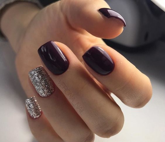 purple nails with metallic glitter accent ones look very chic and bold