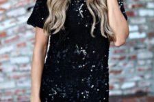 10 a black sequin mini dress with short sleeves is holiday take on a LBD
