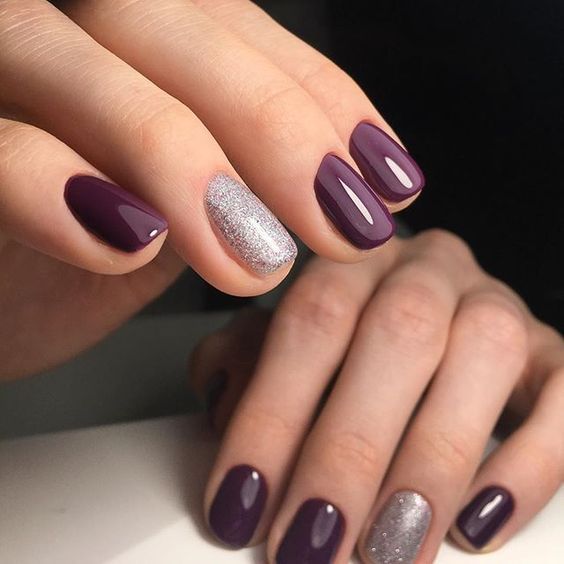 purple manicure with silver glitter accent nails look very chic