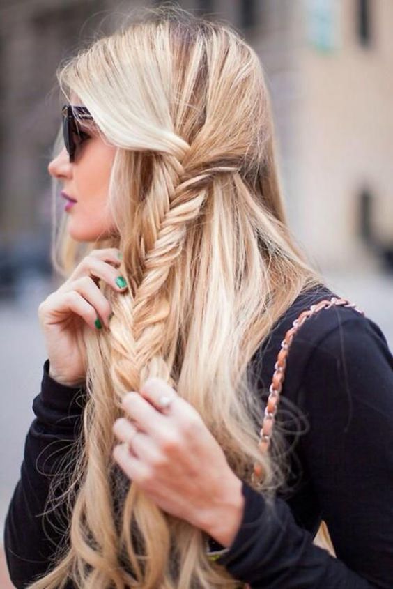 a half updo with a side fishtail braid can be made right on the run