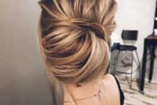 Picture Of a messy sided low updo with bangs for medium length hair