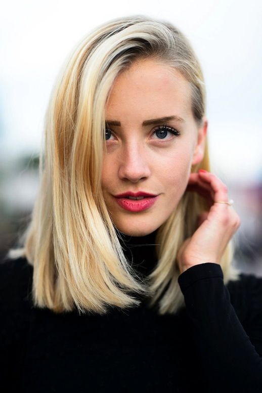 a blunt long bob and a subtle red lip are ideal for holidays